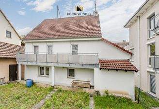 Einfamilienhaus mit Garten und Garage