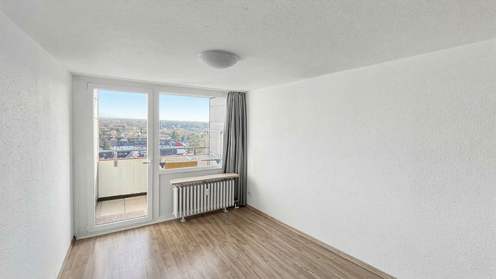 Schlafzimmer mit Balkonzugang