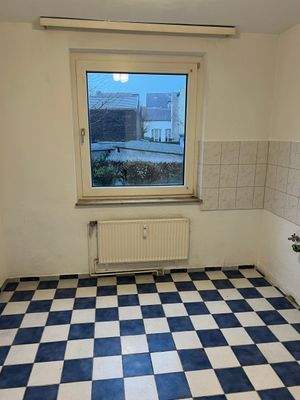 Küche mit Schachbrettboden