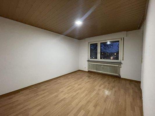 Wohnzimmer mit Balkon