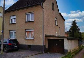 1 Außenansicht mit Garage_LUM_reserviert.jpeg