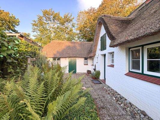 Ihr Herzstück. Hauseingang.