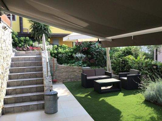 Terrazza e giardino piano terra 1.6.jpeg