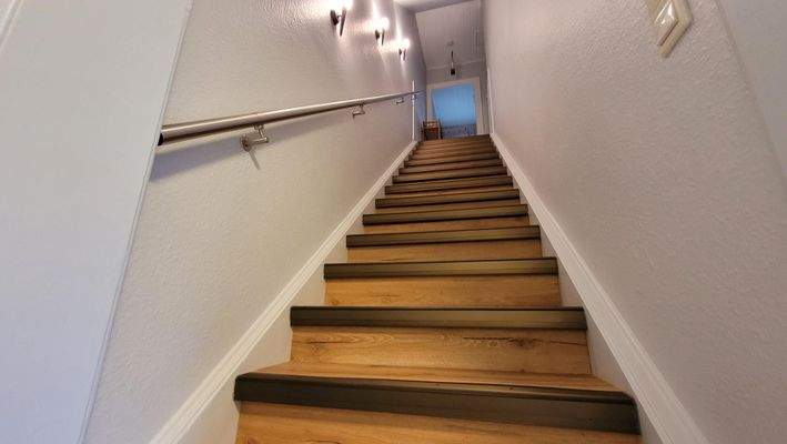 Treppenaufgang ins Obergeschoß