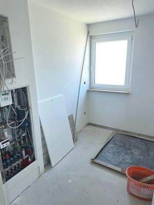 Abstellraum mit Verteilung Fußbodenheizung