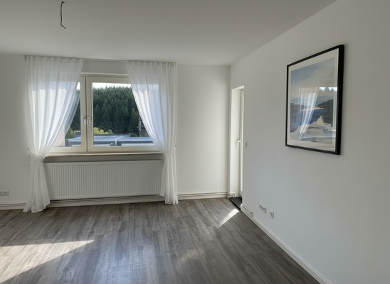 Wohnbereich mit Balkonzugang WE06