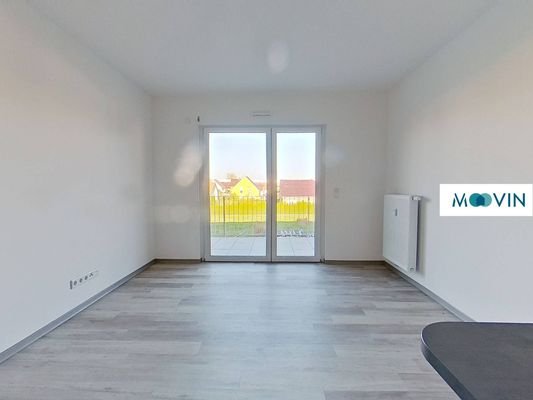 Ansicht I: Wohn- und Esszimmer mit offenem Küchenbereich