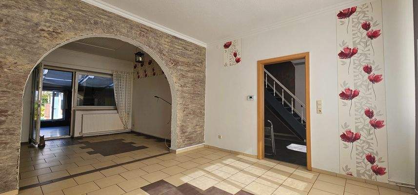 Esszimmer, Wohnzimmer mit Blick auf den Wintergarten