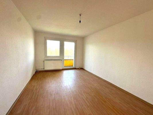 Wohnzimmer mit Balkon