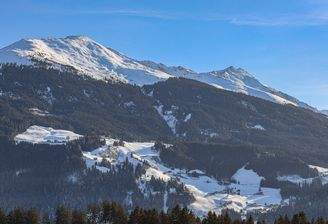 KITZIMMO-Luxus-Apartmenthaus in einzigartiger Top-Sonnenlage kaufen - Immobilien Hollersbach.