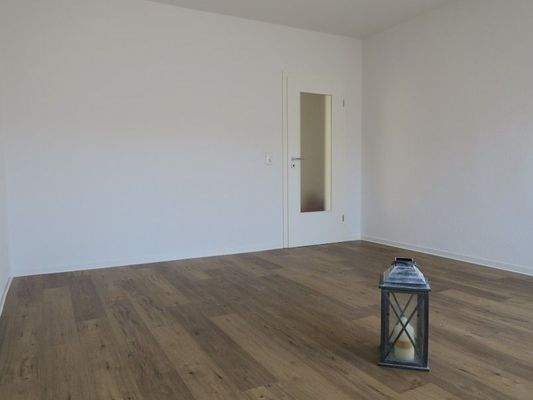 Wohnzimmer mit Balkon