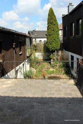 Blick von Dachterrasse auf Innenhof