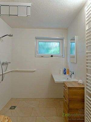 Bad mit bodentiefer Dusche