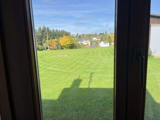 Blick vom Haus auf Landwirtschaftsfläche
