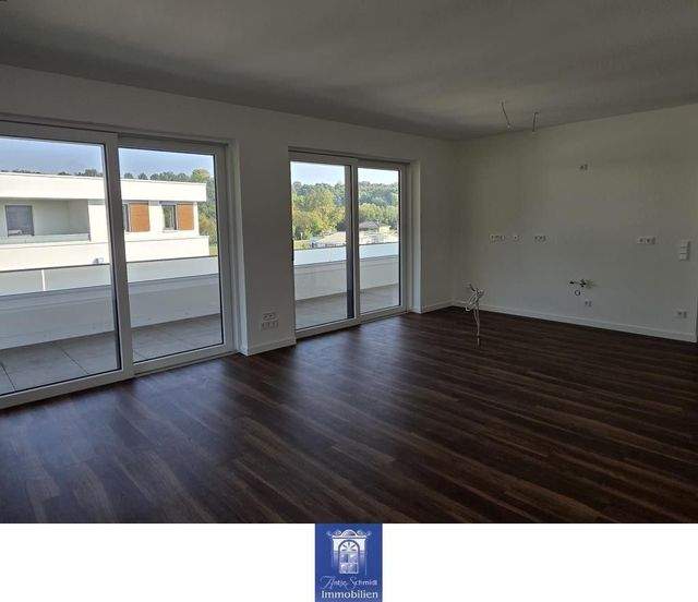 Exklusive Wohnung mit großer Dachterrasse in ruhiger Lage! - Foto 1