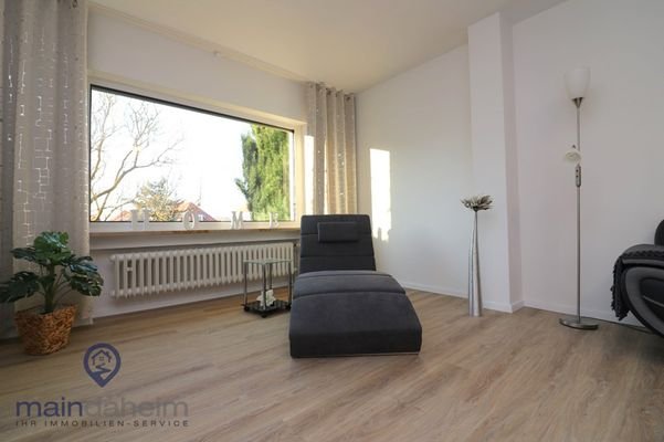 Wohnzimmer mit Zugang zur Terrasse