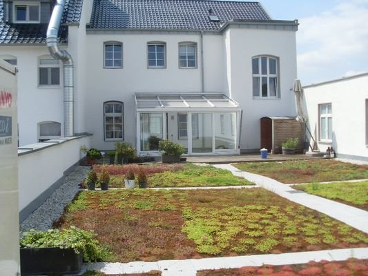 Dachterrasse mit Wintergarten