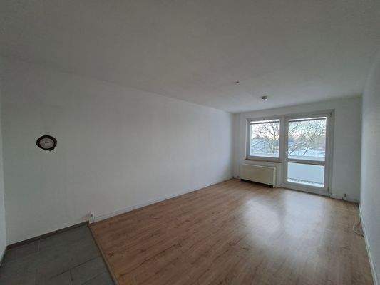 Wohnzimmer mit Balkon