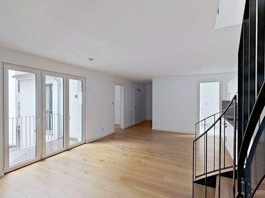 Ansicht II: Wohn- und Esszimmer mit offenem Küchenbereich