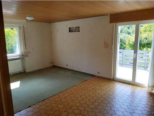 Wohnzimmer OG1 mit Blick zur Terrasse und Garten