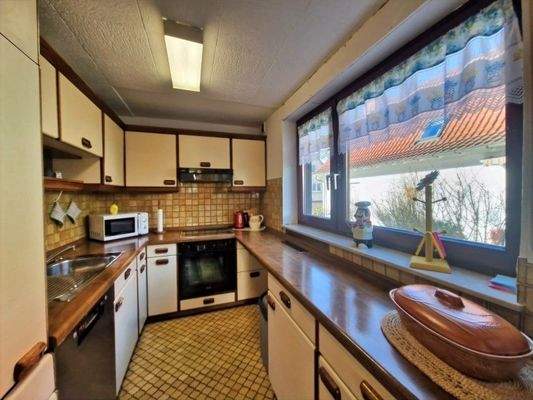 Küche an der guten Stube gelegen