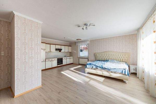 Schlafzimmer mit eigener Küche