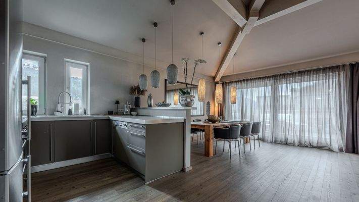 KITZIMMO-Hochwertige Haushälfte am Golfplatz kaufen - Immobilien Kitzbühel.