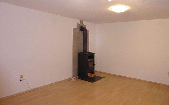 Kachelofen im Wohnzimmer ELW