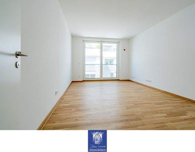 Charmante Neubauwohnung mit hofseitigem Balkon, Fußbodenheizung, EBK, Gäste-WC! - Foto 2