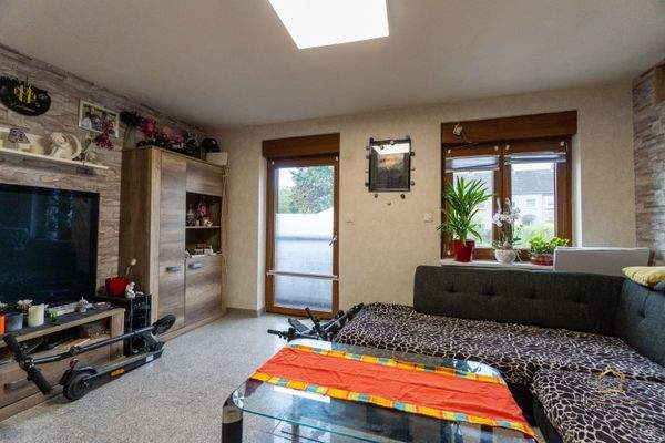 Wohnzimmer + Ausgang Terrasse