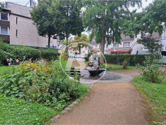 Kleiner Park mit Brunnen