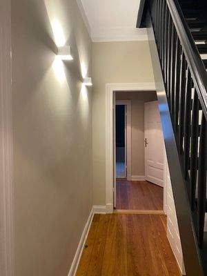 1. OG - Flur mit Holztreppe nach oben