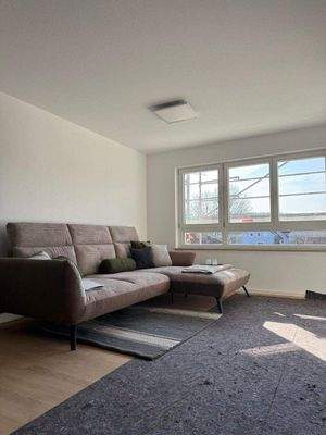 Wohn- und Esszimmer mit Zugang zum eigenen Balkon