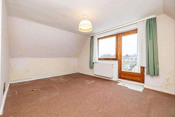 Dachgeschoss - Schlafzimmer mit Zugang zum Balkon