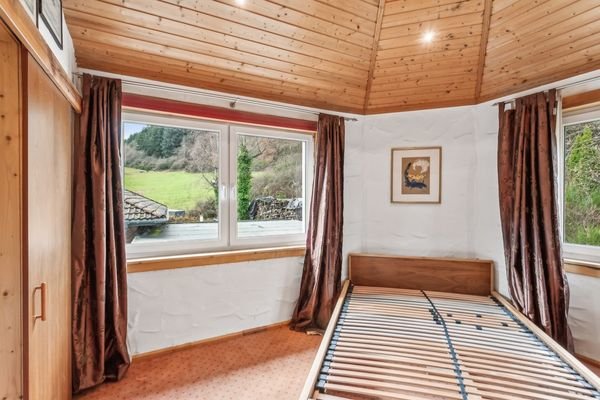 Schlafzimmer mit Blick ins Grüne