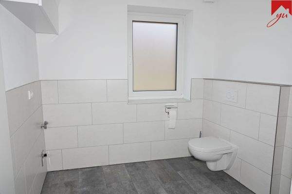 Badezimmer mit Waschmaschinenanschluss