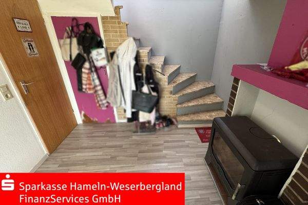 Eingang EG mit Duschbad und Treppenaufgang