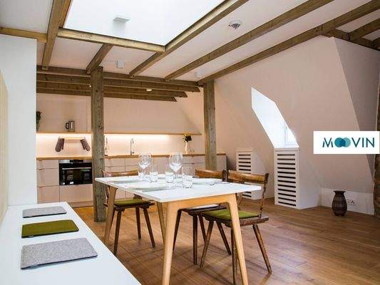 Ansicht I: Wohn- und Esszimmer mit offenem Küchenbereich