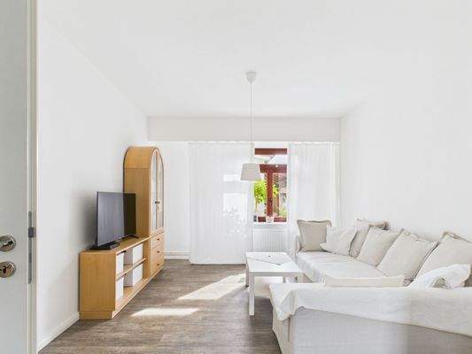 Wohnzimmer - Lütt Immobilien - Malente