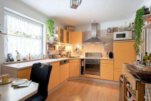 Küche mit Einbauküche 