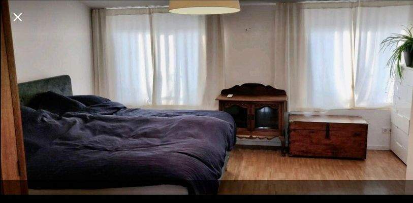 Schlafzimmer mit Ankleidebereich