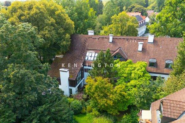 Außenansicht mit Blick in den Gemeinschaftsgarten 