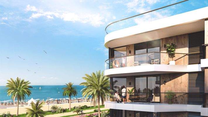 Aussenansicht eines Apartmenthauses im Projekt