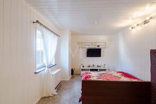 Freundliches Gästezimmer im Dachgeschoss