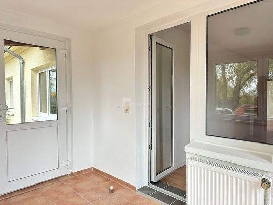 Vom Wintergarten auf die Terrasse und in den Garten