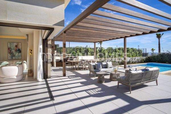 Move-In Ready Beachfront House in a Gated Complex in Marbella