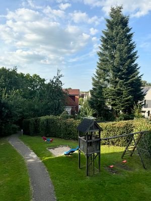 Gemeinschaftsgarten mit Spielplatz