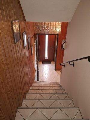 Treppenhaus zum Windfang im Erdgeschoß