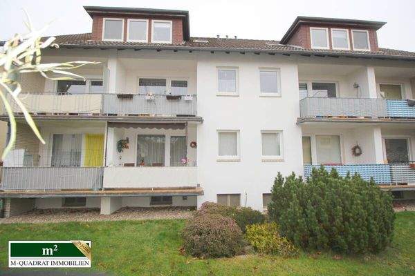 Gartenblick auf MFH mit Loggien u. 2 Erkern