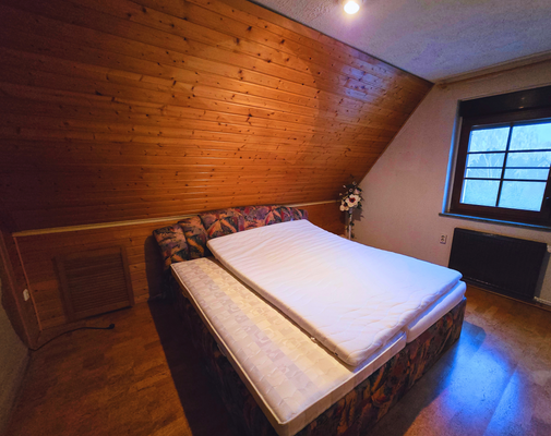 Schlafbereich im Dachgeschoss.png